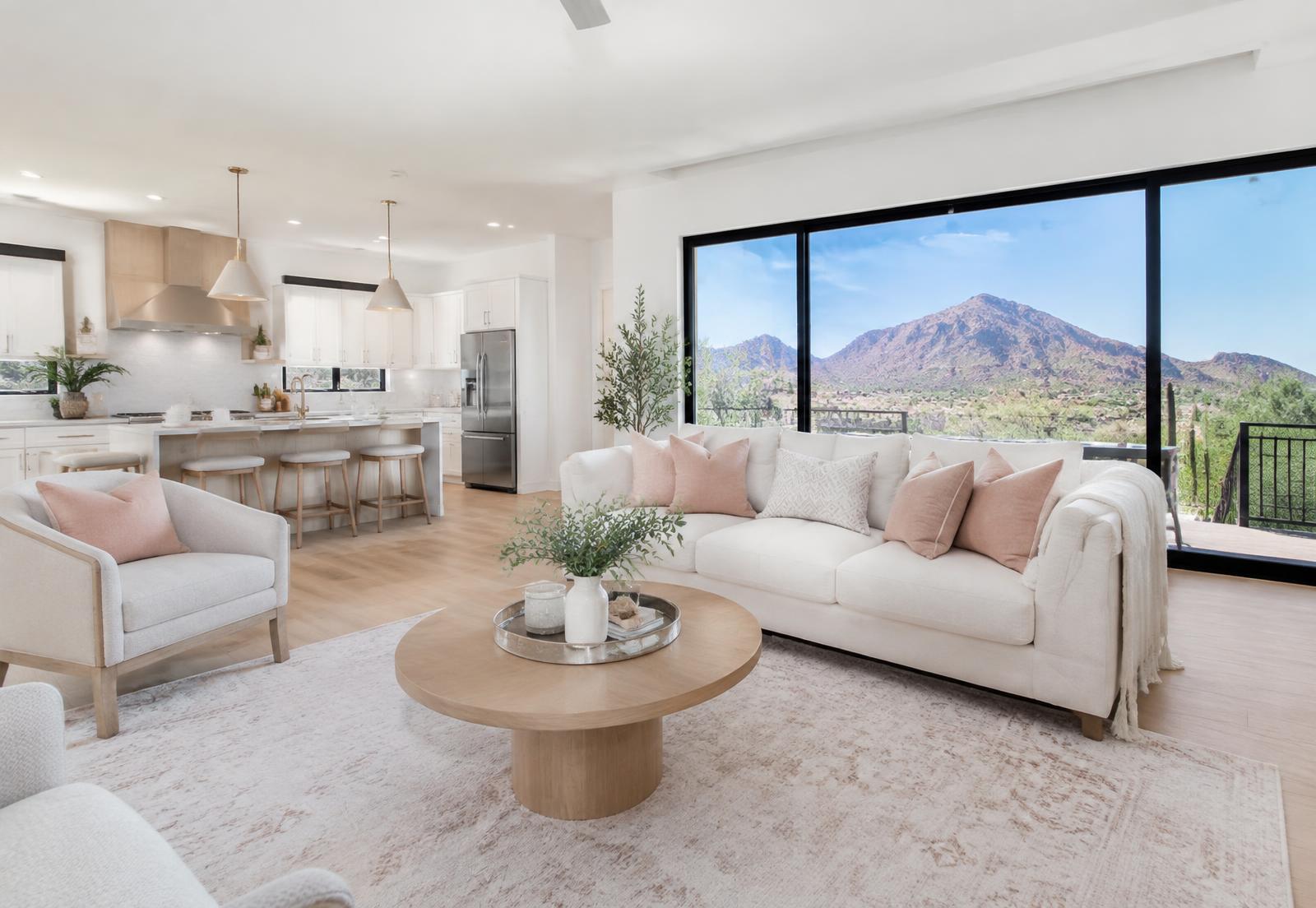 Bright, spotless modern Arizona living room and kitchen cleaned by Barbie's Cleaning
